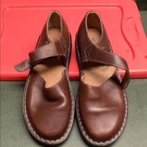 Brown leather flats